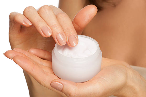 istock Woman applying hand cream 178015043