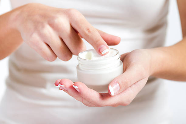 istock Body care. Woman applying cream on hands 178015152