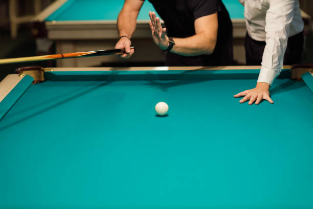 istock Billiard player at billard table or snooker american billiards pool sport game 1780153706