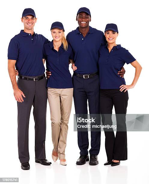 Young Service Team Group Portrait Stock Photo - Download Image Now - Uniform, Teamwork, Delivery Person