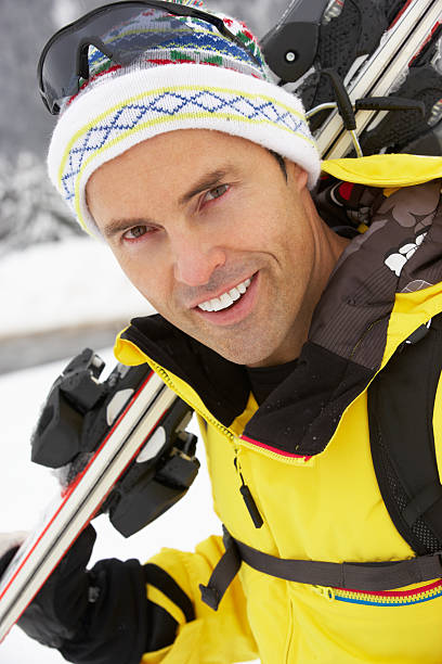 istock Middle Aged Man On Ski Holiday In Mountains 178015950