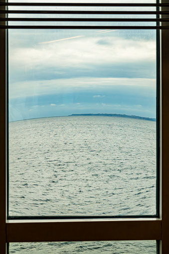 Helsingborg, Sweden A distorted view of the sea through a window on a ferry to Denmark.