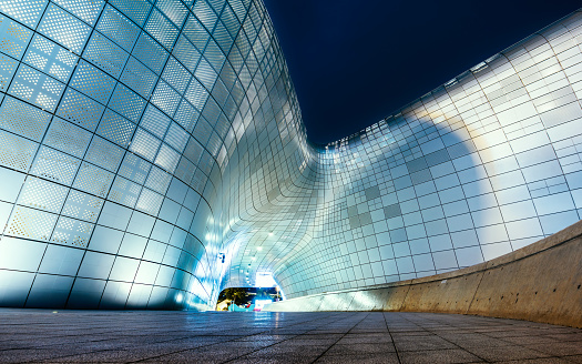 Seoul, South Korea: July 22, 2023: Modern architecture of Dongdaemun Design Plaza or DDP at night, This Plaza is the famous Moderness landmark of Seoul, South Korea.