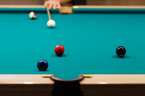 istock Billiard player at billard table or snooker american billiards pool sport game 1780163012