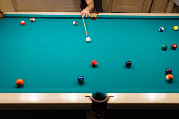 istock Billiard player at billard table or snooker american billiards pool sport game 1780163021