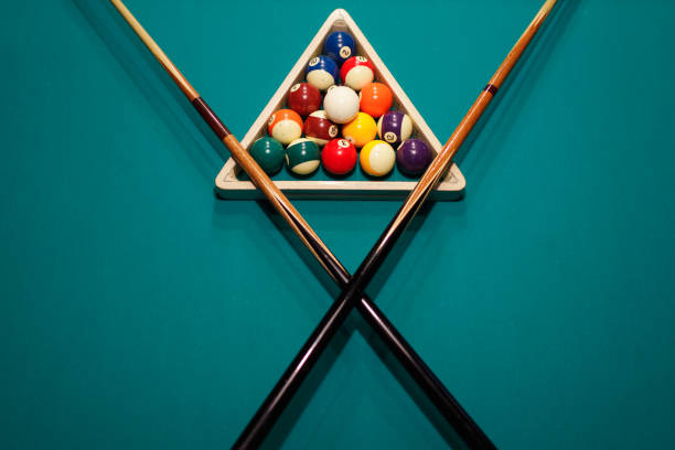 istock Billiard accessories balls and cue on a billiard table 1780163029