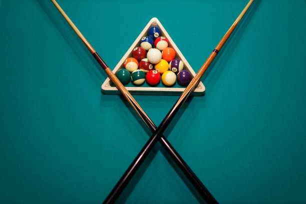 istock Billiard accessories balls and cue on a billiard table 1780163032