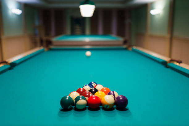 istock Billiard accessories balls and cue on a billiard table 1780163070