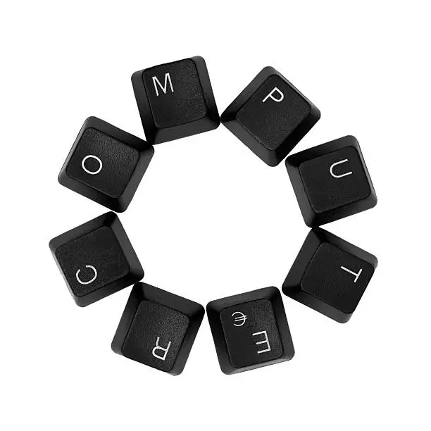 COMPUTER word written on a keyboard. Isolated on a white background. Circular shape.