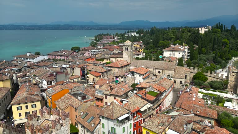 Aerial view of Sirmione on Lake Garda in Northern Italy, aerial view of the shoreline of Lake Garda, the largest Lake Garda in Italy, aerial view of  Sirmione town on Lake Garda in Italy, Aerial view Sirmione town