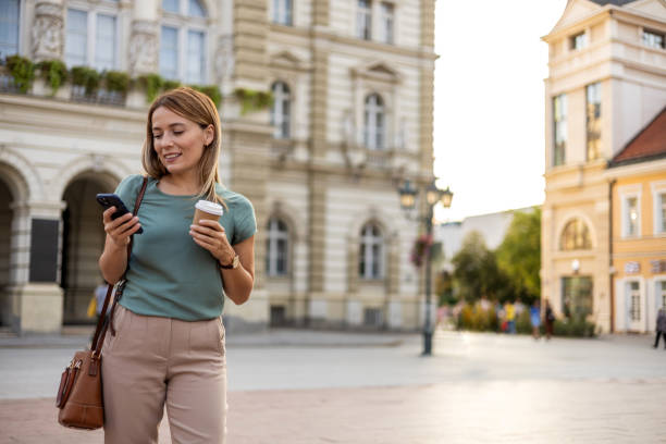 istock Young woman using her phone and enjoying her day. 1780182599