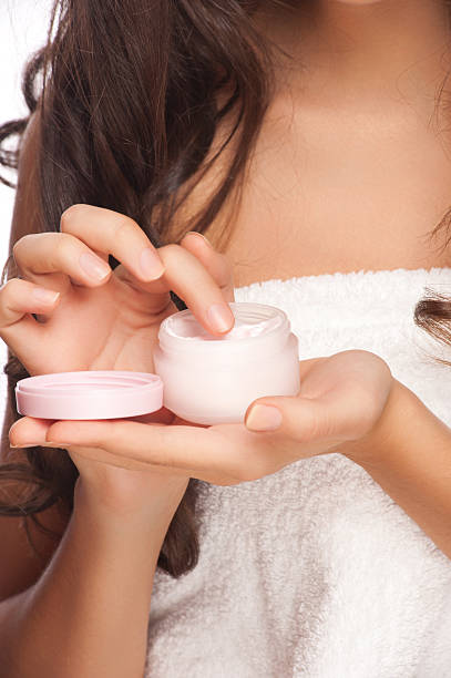 istock Woman applying hand cream 178019055
