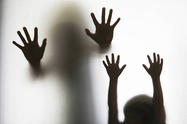 istock shadow of mother and son 178019386