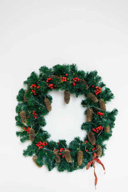 istock Christmas wreath on a white background with copying space 1780194739