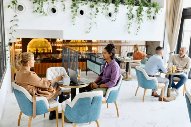 istock Modern people sitting at the hotel cafe 1780198163