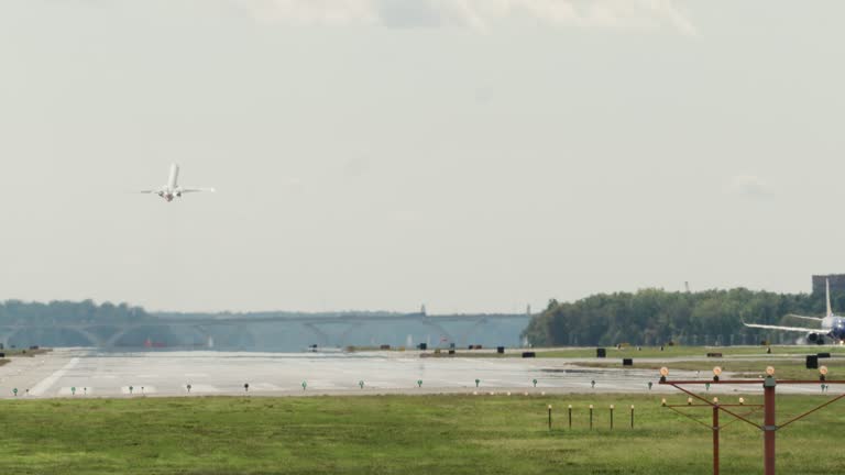 Regional Jet Takes Off from Runway into Empty Sky