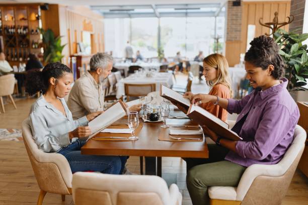 istock Business people looking at the menu during a lunch break at the hotel 1780198757