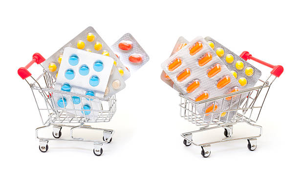 istock Multicolored pills packs in shopping cart 178020653