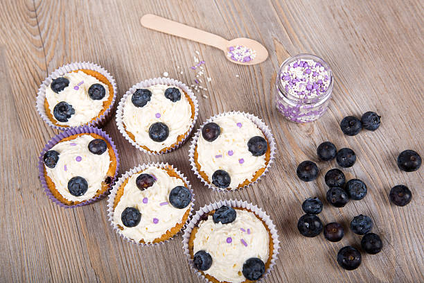 istock Delicious cupcake with blueberries, cream and fresh berries 178020974