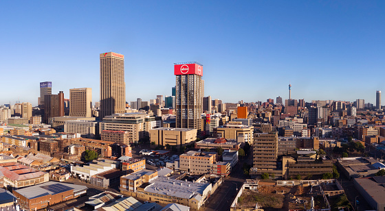 Johannesburg city with the prominent Transnet building in the Carlton Centre, Ponte City apartments and Telkom Communications tower, seen from the south.