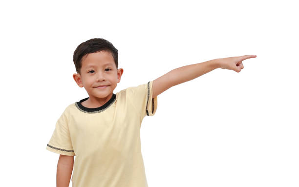 istock Asian little boy pointing to beside isolated on white background. 1780234783