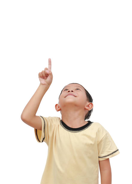 istock Asian little boy looking and pointing up isolated on white background. 1780234807
