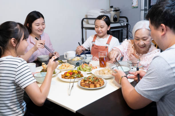 istock Chinese family having lunch at home 1780234845