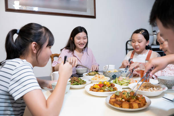 istock Chinese family having lunch at home 1780234861