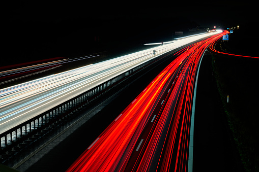 Danish highway with cars making light trails at low shutter speed