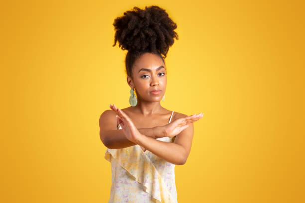 istock Sad confident young black woman crossed her arms, making stop sign 1780243585