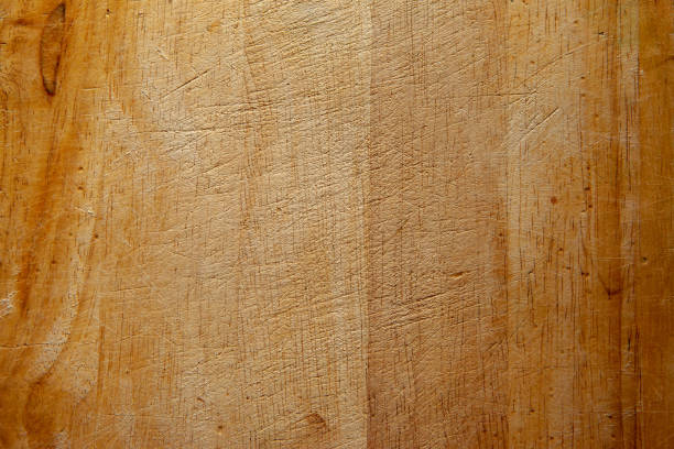istock Surface of wooden cutting board, top view. Empty wood board for text, design, presentation, for pictures of dishes in the restaurant. Food advertising for publication, poster. High quality photo 1780244781