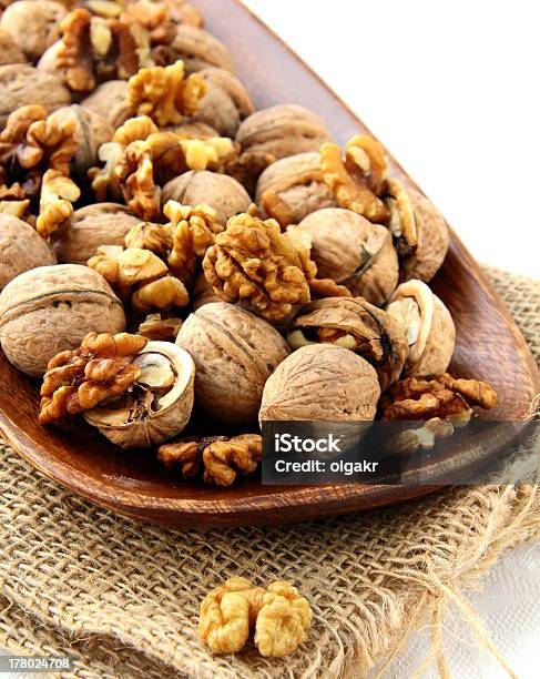 Walnuts On A Wooden Plate Stock Photo - Download Image Now - Appetizer, Close-up, Cracked