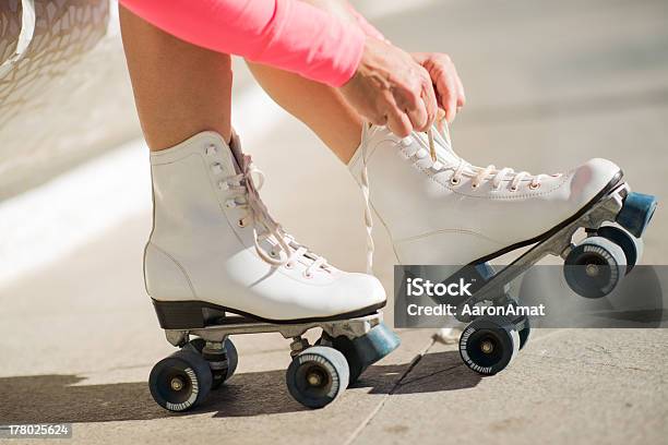 Closeup Of Legs With Roller Skating Shoe Stock Photo - Download Image Now - Adult, Adults Only, Boot