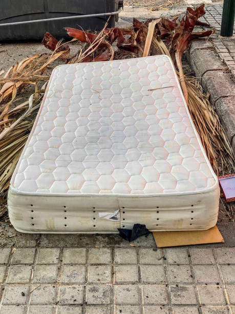 istock Mattress abandoned on the sidewalk 1780257684