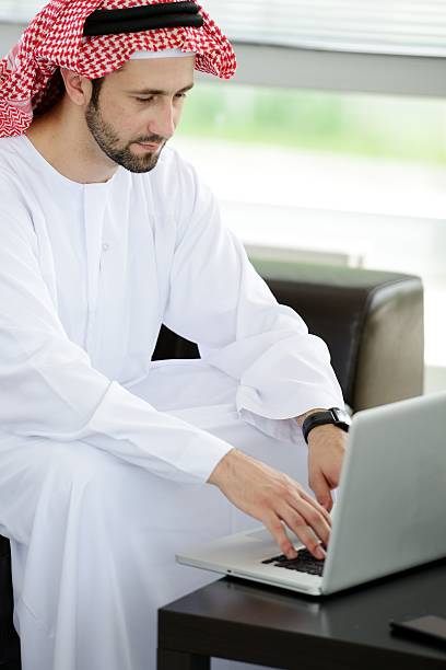 istock Portrait of a smart arabic business man using laptop 178027747