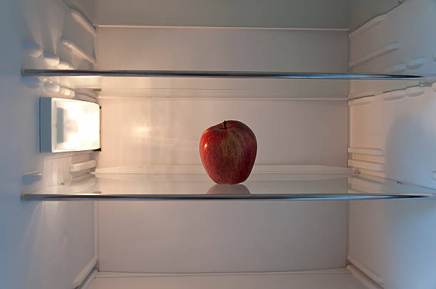 istock apple on a shelf in the refrigerator 178027927