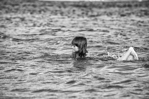 A young girl in the lake, Whistler.