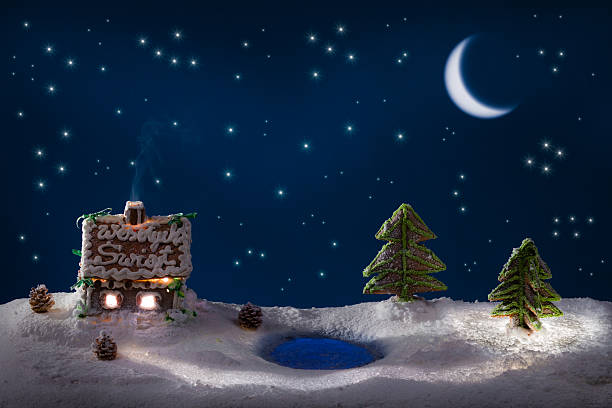 istock Snowy gingerbread cottage with stars at the lake 178028107