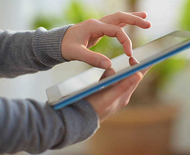 istock Close-up Of Hand Holding Digital Tablet 178028310