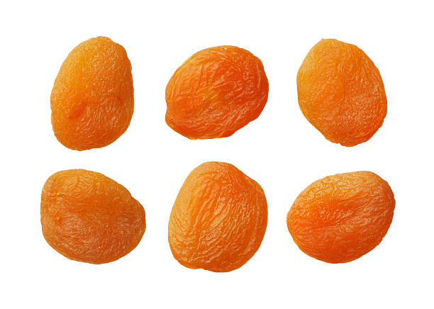 getrocknete aprikosen, isoliert auf weiss - dried apricot stock-fotos und bilder