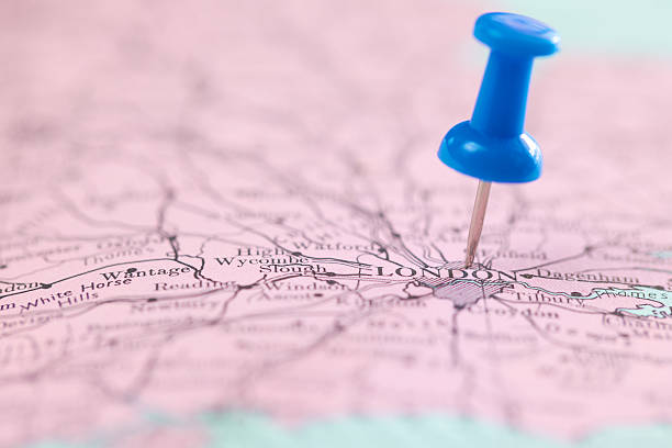 istock push blue pin pointing on the map at London 178029199