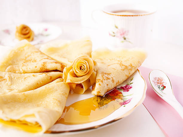 Delicious russian pancakes composition stock photo
