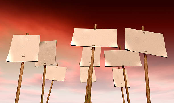 istock Blank Strikers Picket Plackards And Red Sky 178029780