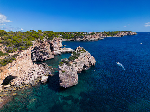 This is an incredibly popular photo opportunity from Mallorca es Ponatas in the Bay of Santany. This is an incredibly popular photo opportunity from Mallorca es Ponatas in the Bay of Santany. It is an incredibly beautiful place with the stone arch