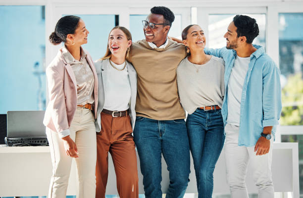 istock Smile, team building and young business people in office in collaboration for creative project in meeting. Happy, diversity and group of professional designers bonding and talking in workplace. 1780303898