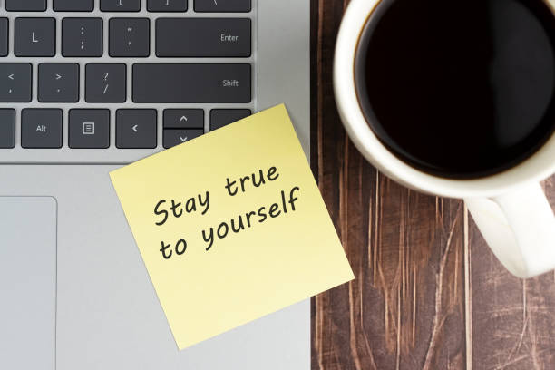 istock Stay true to yourself inspirational quotes on adhesive note 1780304120