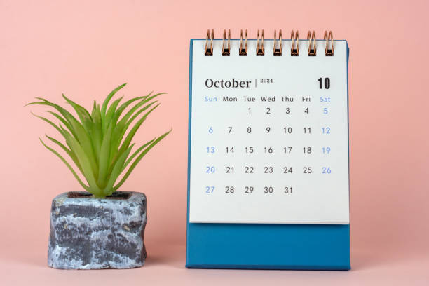 istock October 2024 Desk Calendar on Blue Background 1780304491