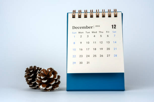 istock 2024 December Desk Calendar on Blue Background 1780304506