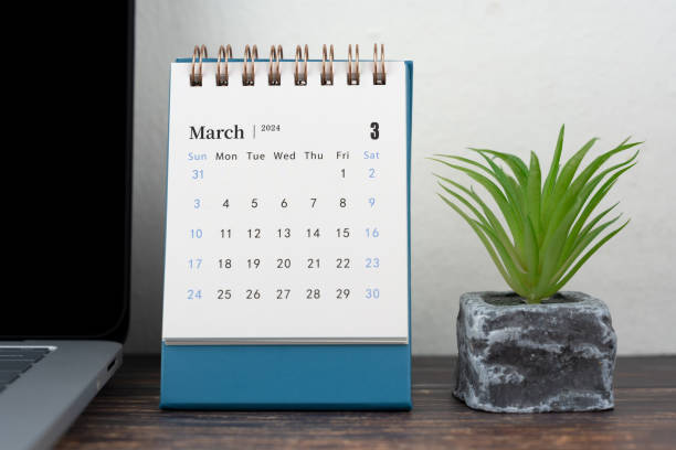 istock 2024 March Desk Calendar on Blue Background 1780305092