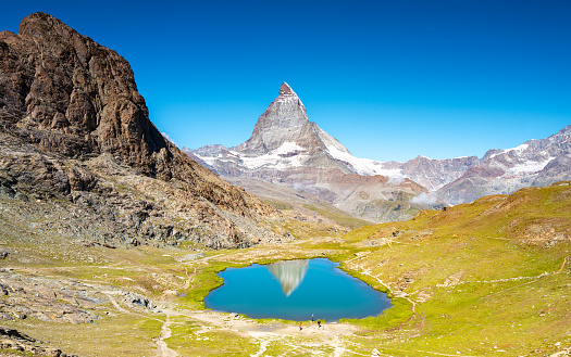 Switzerland travel - Riffelsee in the Swiss Alps with views of the Matterhorn in the background
